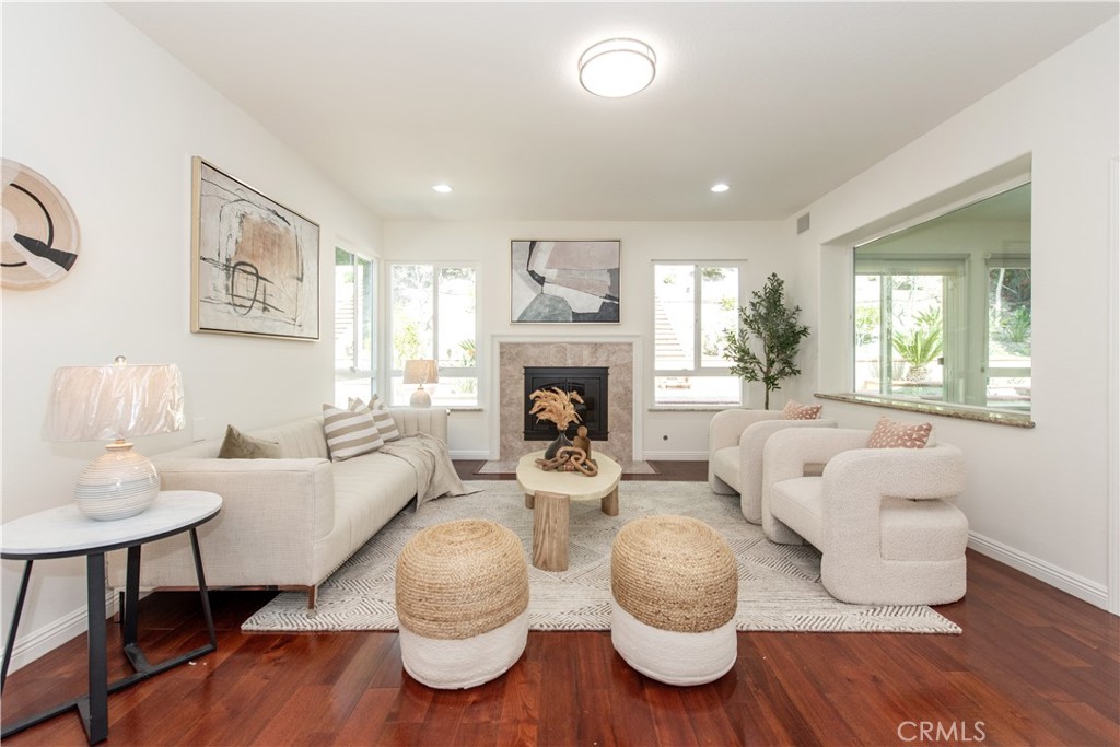 19933 Hidden Springs Road Walnut, CA 91789 - Photo 2 of 26 a living room with furniture and a fireplace
