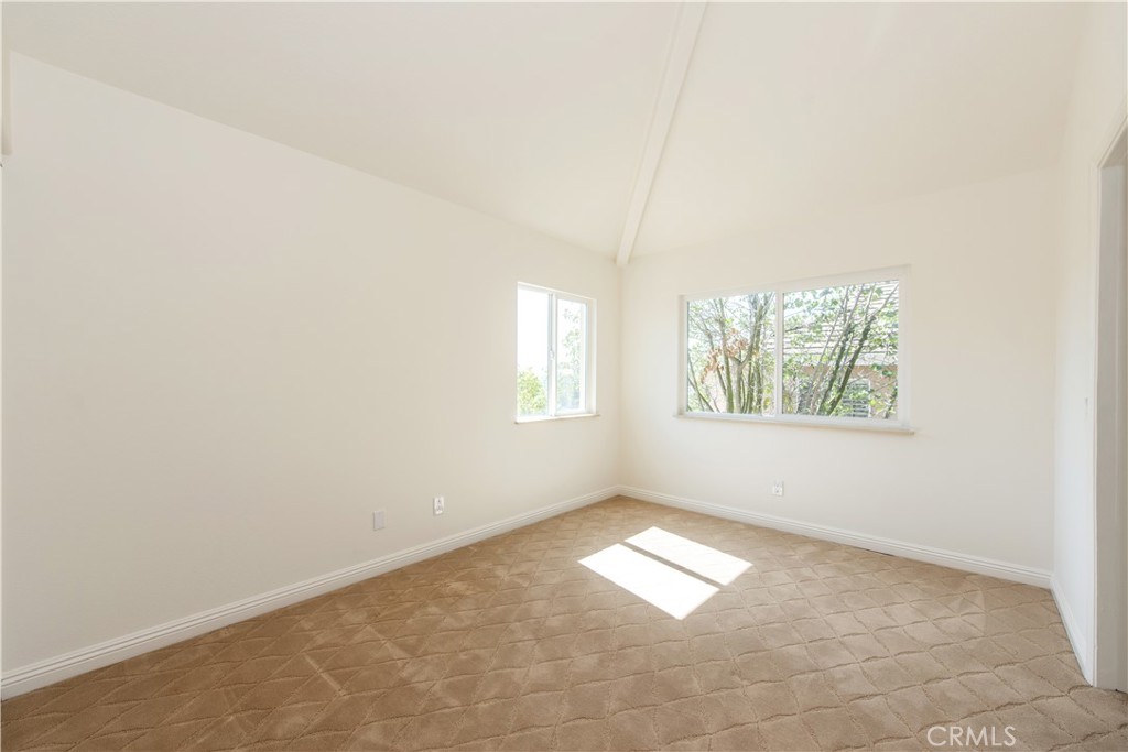 19933 Hidden Springs Road Walnut, CA 91789 - Photo 23 of 26 an empty room with windows