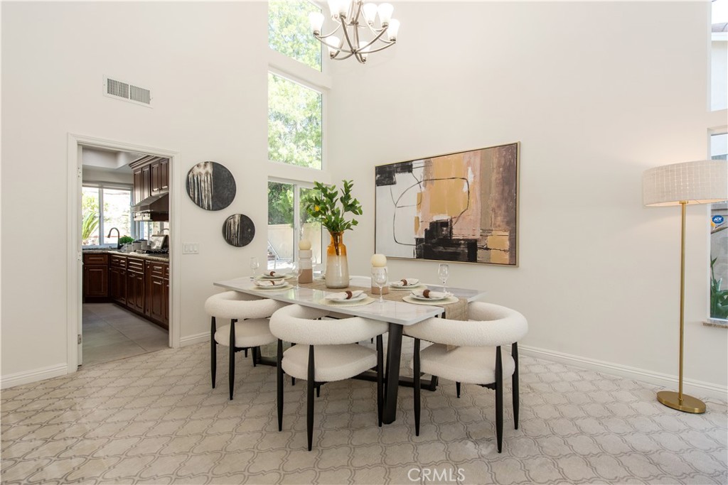19933 Hidden Springs Road Walnut, CA 91789 - Photo 6 of 26 a dining room with chandelier and window