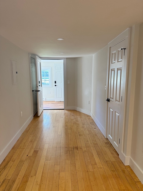 244 Main Street, Unit 1 North Andover, MA 01845 - Photo 12 of 13 a view of a livingroom with wooden floor