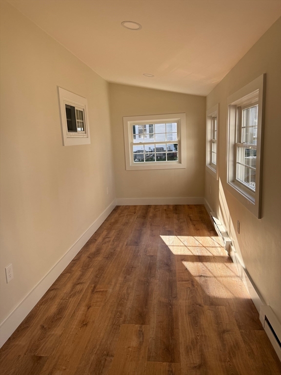 244 Main Street, Unit 1 North Andover, MA 01845 - Photo 3 of 13 a view of an empty room with a window