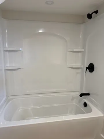a bathroom with a tub
