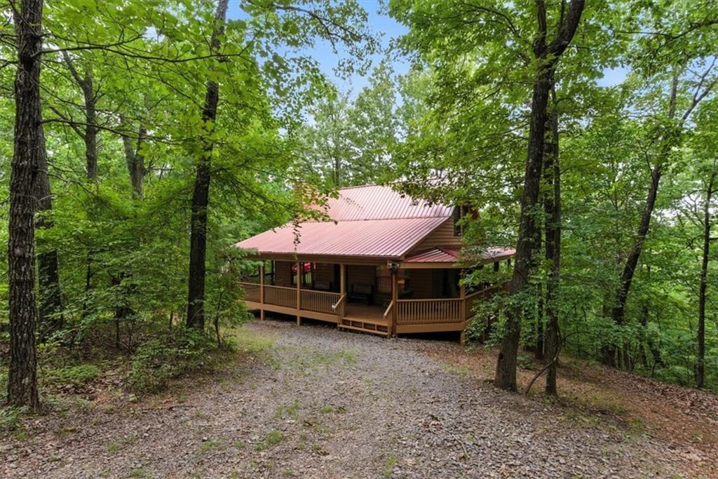 a view of a house with a back yard