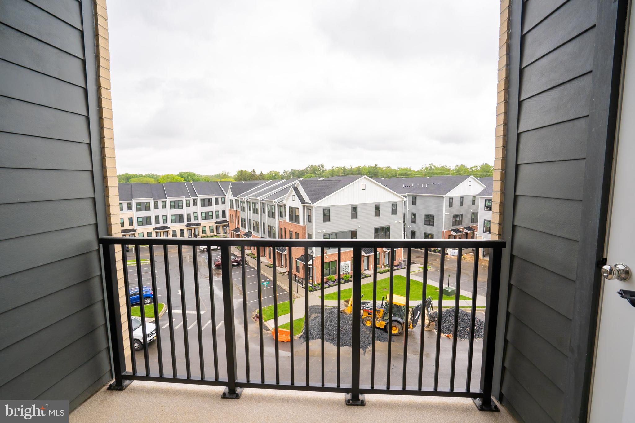 1 Culvert Drive, Unit 312 Princeton Junction, NJ 08540 - Photo 11 of 58 a view of a balcony with a floor to ceiling window