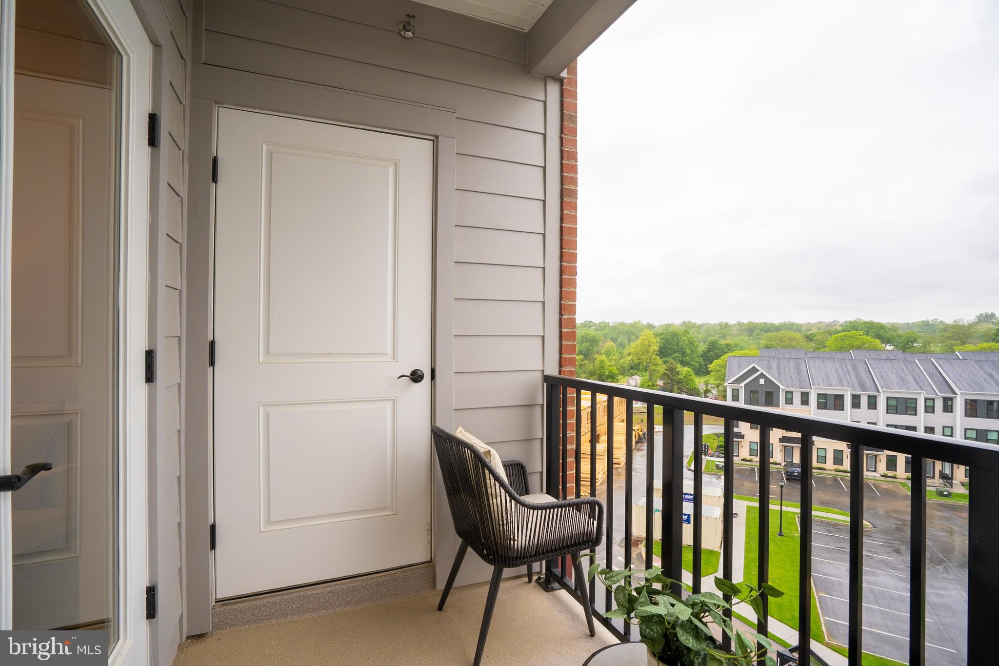 1 Culvert Drive, Unit 312 Princeton Junction, NJ 08540 - Photo 15 of 58 a view of a balcony with furniture