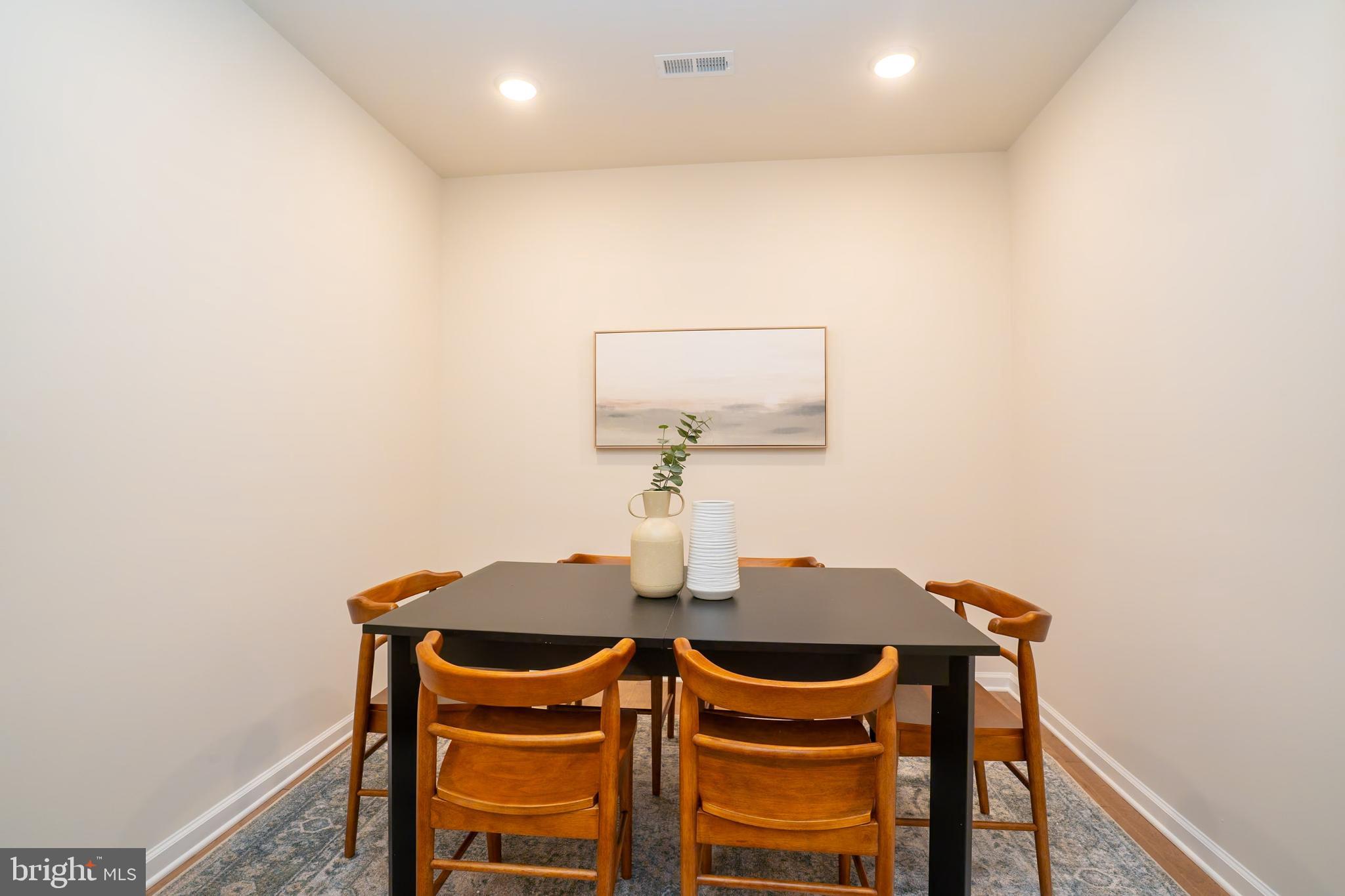 1 Culvert Drive, Unit 312 Princeton Junction, NJ 08540 - Photo 22 of 58 a view of a dining room with furniture