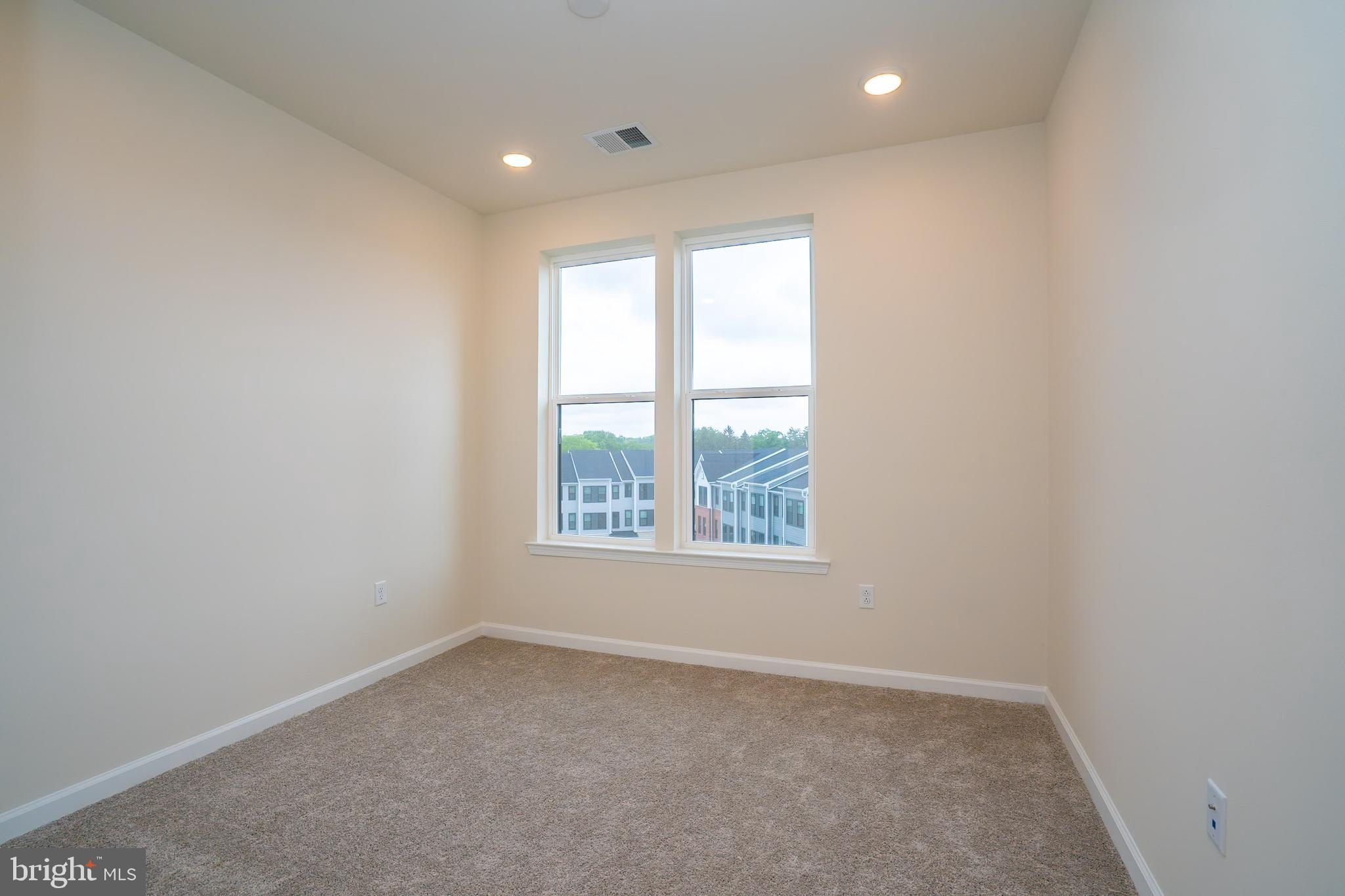 1 Culvert Drive, Unit 312 Princeton Junction, NJ 08540 - Photo 23 of 58 an empty room with a window