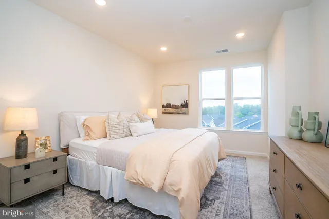 a bathroom with a shower and a bath tub