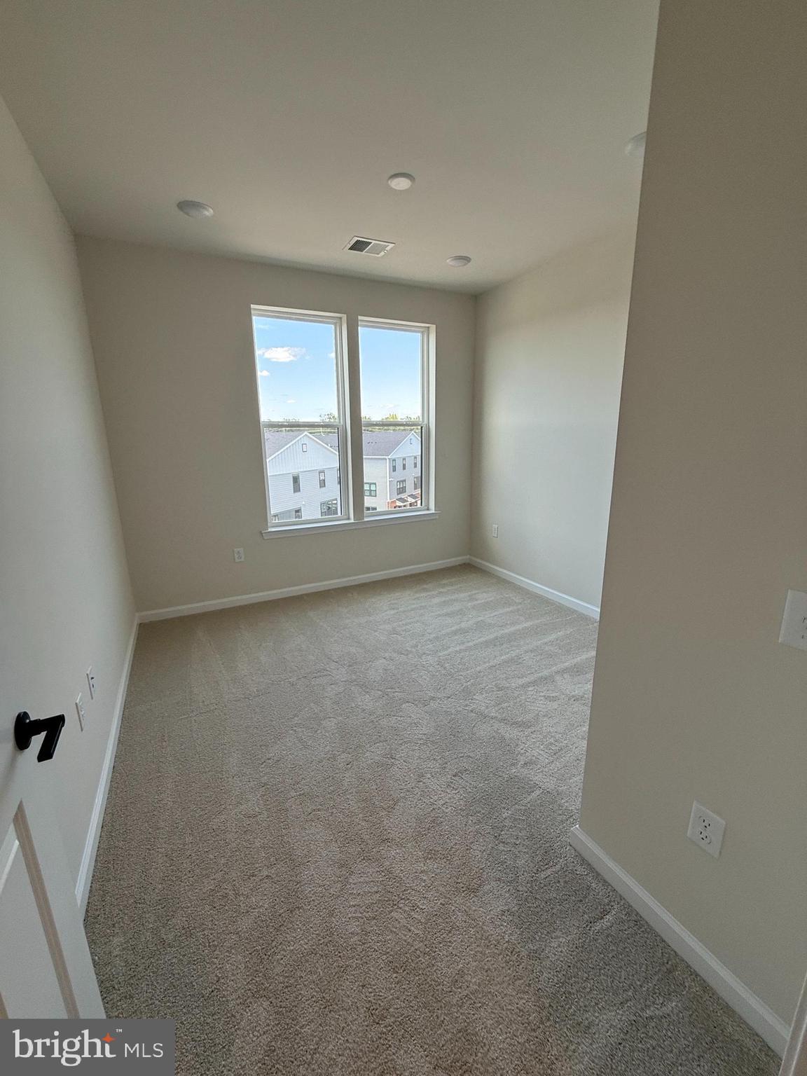 1 Culvert Drive, Unit 312 Princeton Junction, NJ 08540 - Photo 46 of 58 an empty room with a window
