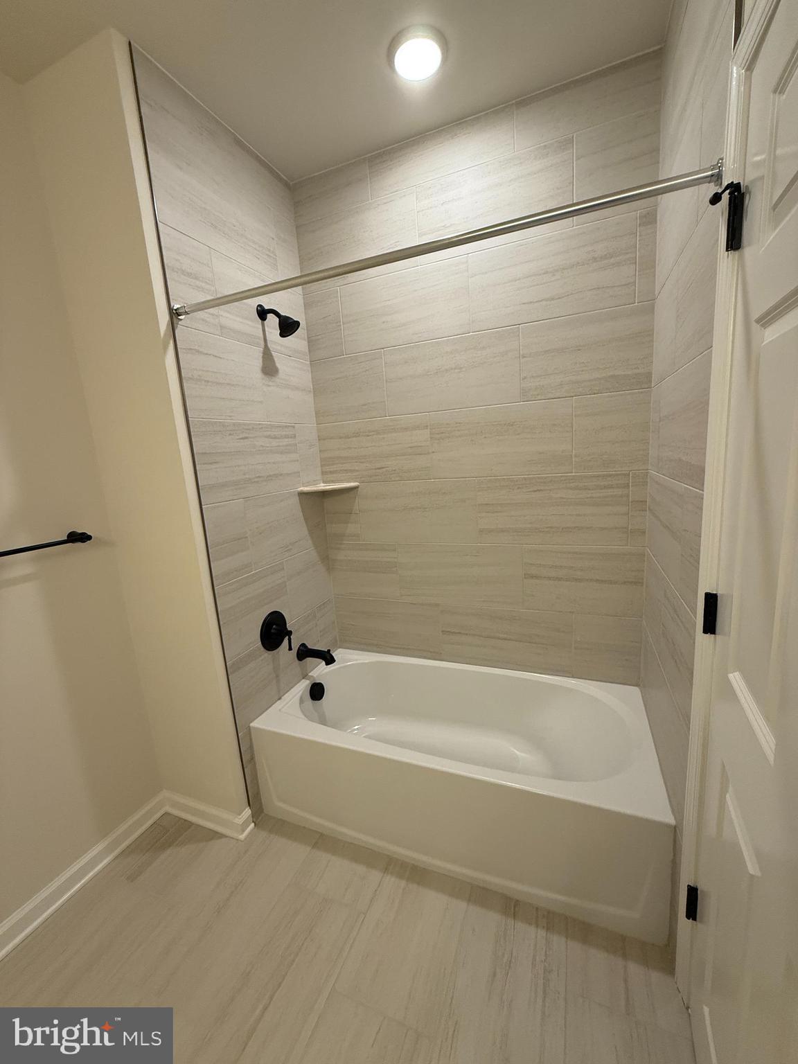 1 Culvert Drive, Unit 312 Princeton Junction, NJ 08540 - Photo 48 of 58 a bathroom with a bathtub