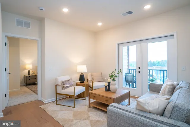 a view of a balcony with a floor to ceiling window
