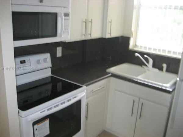 $1,775 | 1801 South Treasure Drive, Unit 409, North Bay Village, FL 33141