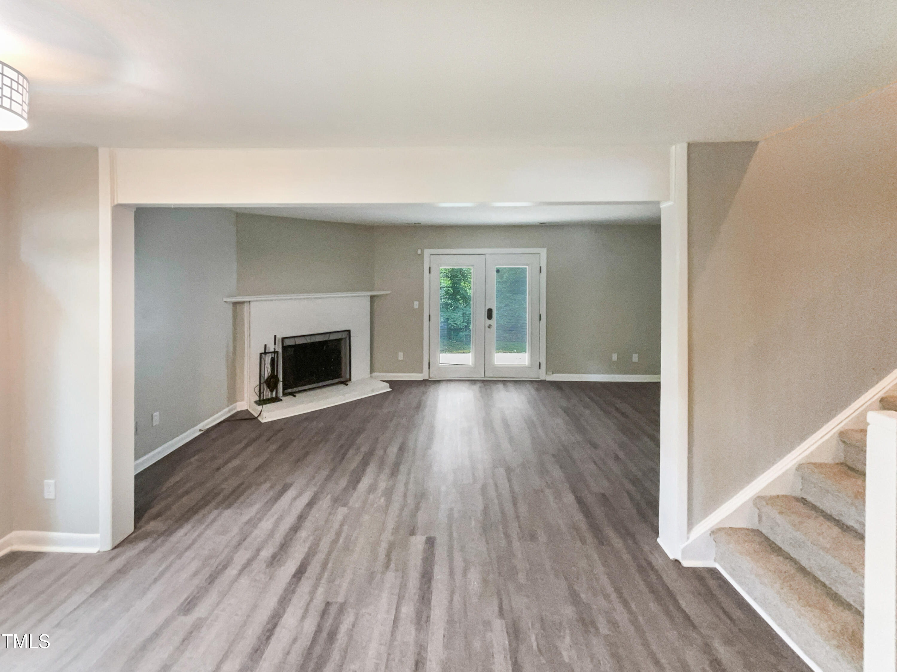 1304 Seaton Road, Unit 7 Durham, NC 27713 - Photo 4 of 18 wooden floor fireplace and natural light in room