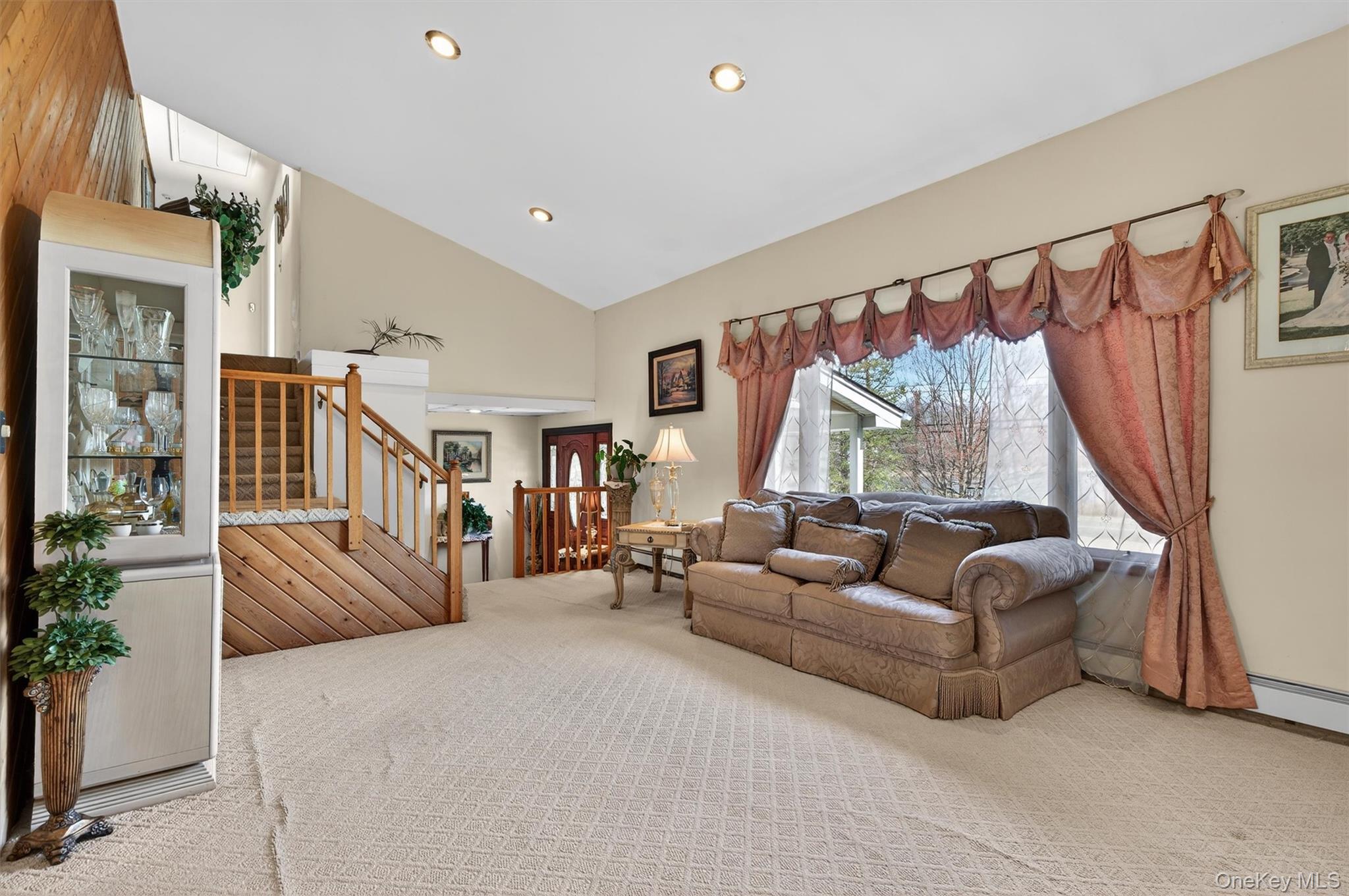 449 West Mombasha Road Monroe, NY 10950 - Photo 29 of 39 a living room with furniture and a large window
