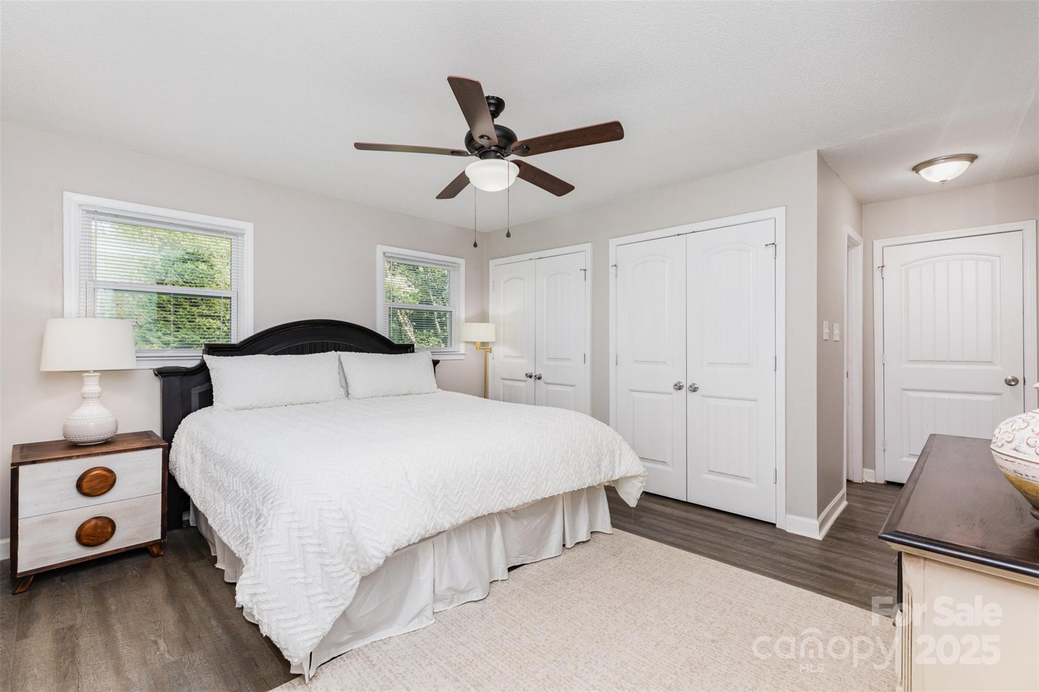 1041 Brawley School Road Mooresville, NC 28117 - Photo 12 of 19 a bedroom with a bed and a window