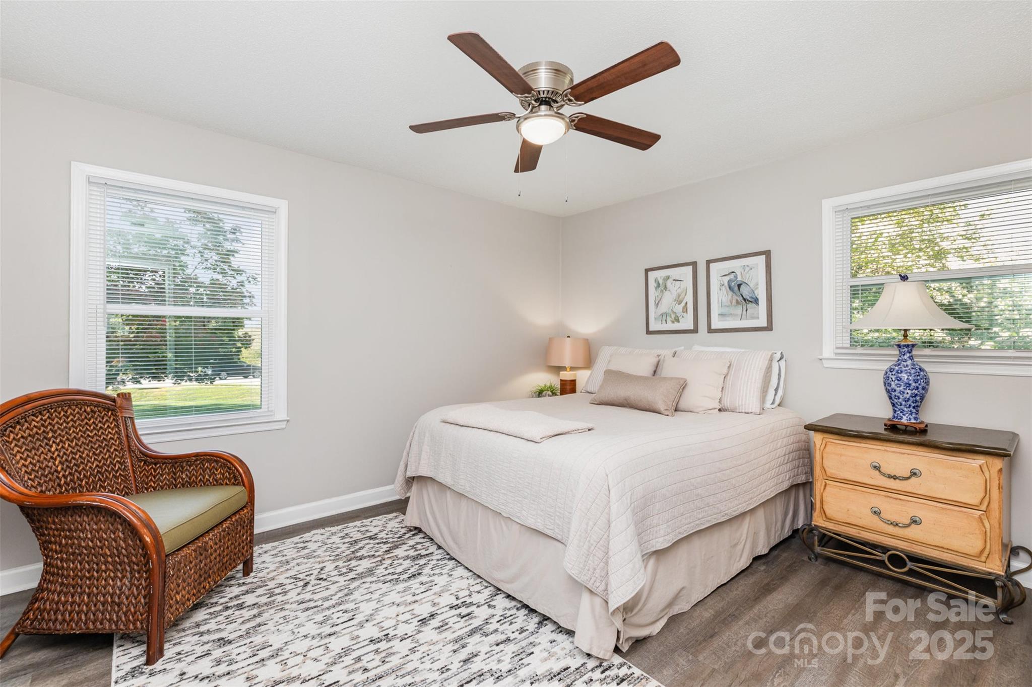 1041 Brawley School Road Mooresville, NC 28117 - Photo 16 of 19 a bedroom with a bed and a couch