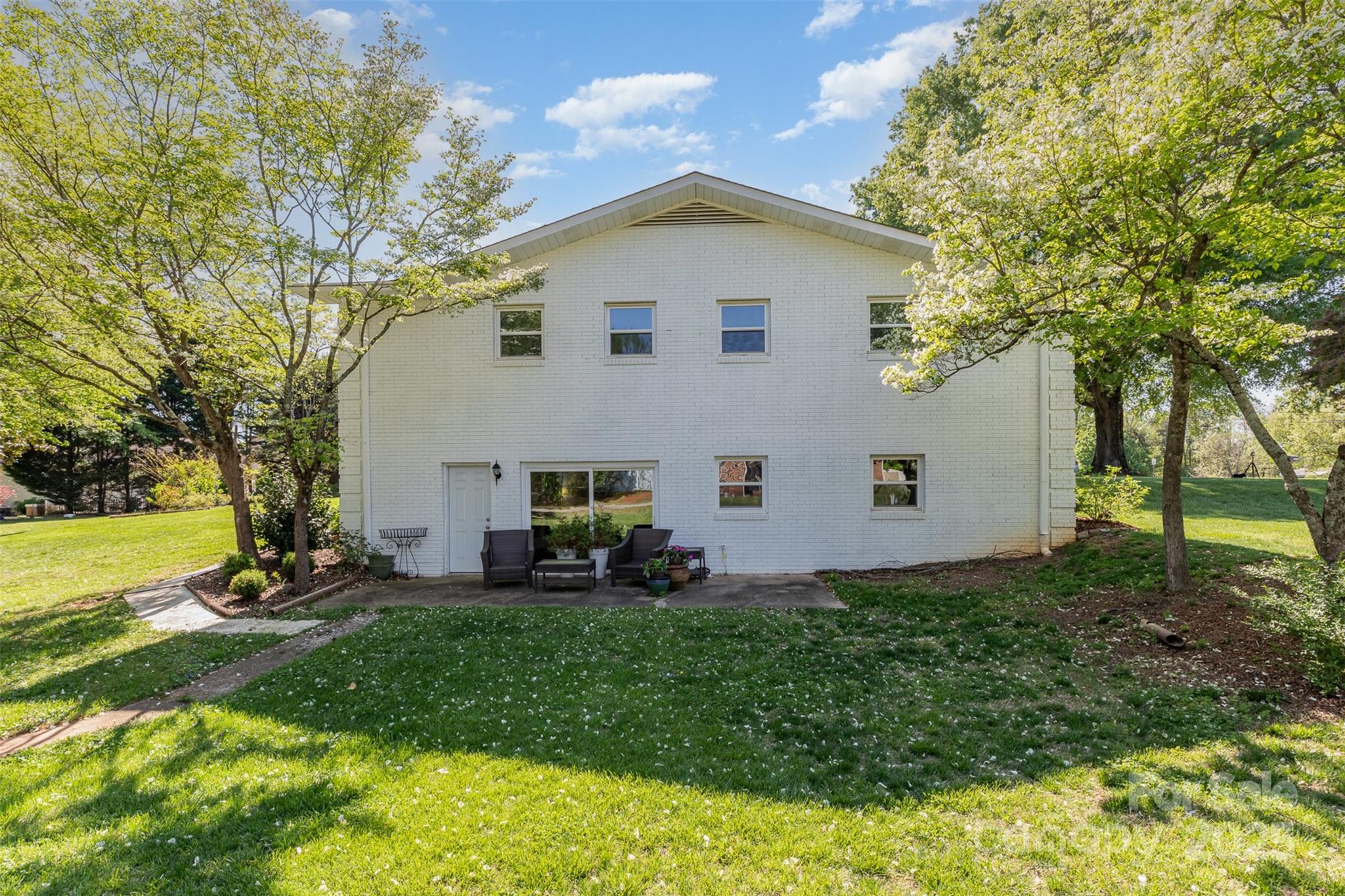 1041 Brawley School Road Mooresville, NC 28117 - Photo 2 of 19 a view of a house with backyard