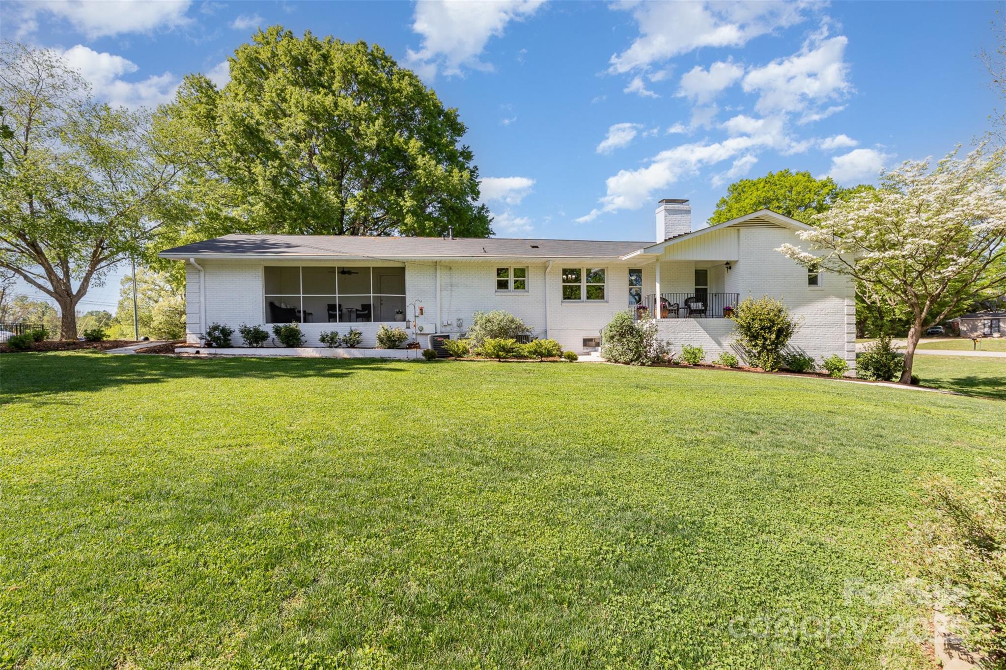 1041 Brawley School Road Mooresville, NC 28117 - Photo 3 of 19 a front view of house with yard and trees