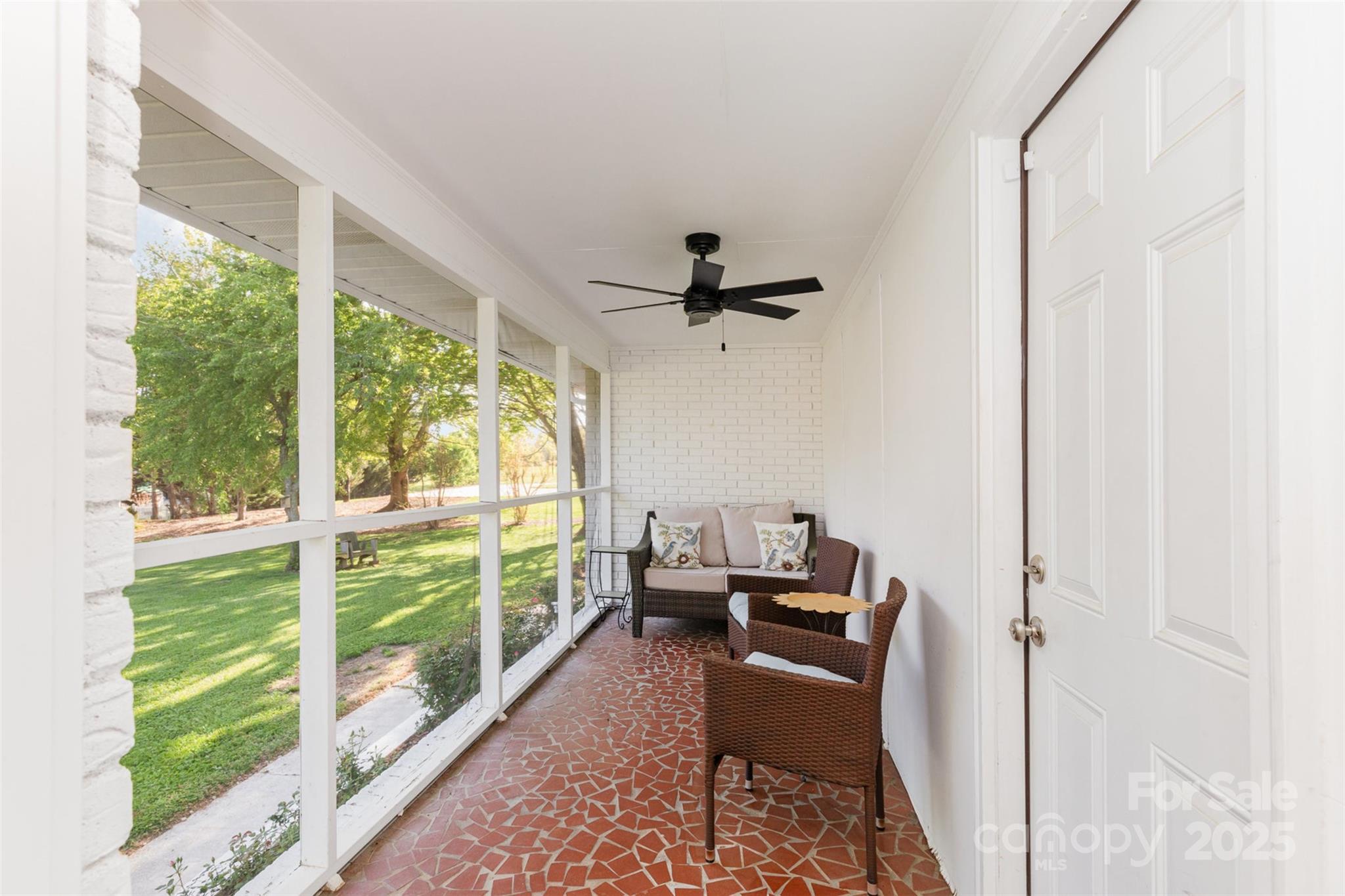 1041 Brawley School Road Mooresville, NC 28117 - Photo 4 of 19 a living room with hardwood floor and a large window
