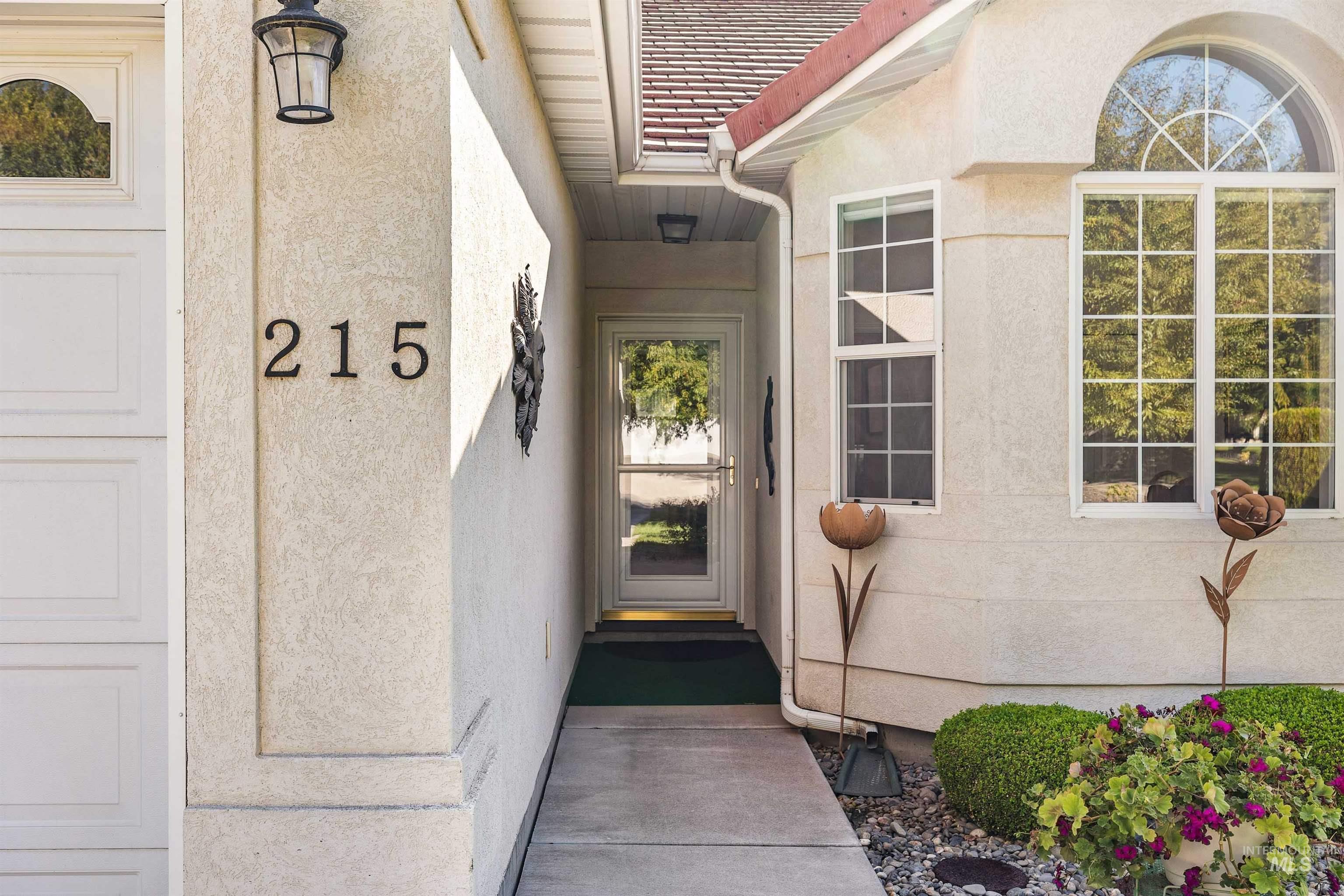 215 Los Lagos Twin Falls, ID 83301 - Photo 2 of 30 Doorway to property featuring stucco siding