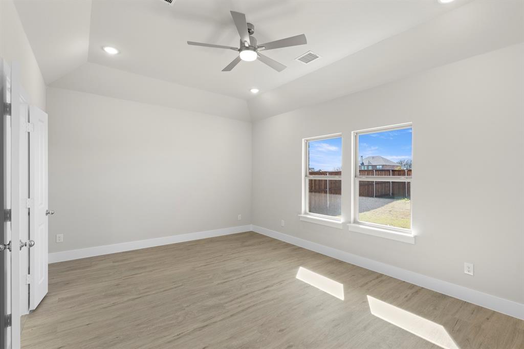 2359 Bell Way Forney, TX 75126 - Photo 26 of 31 wooden floor in an empty room with a window