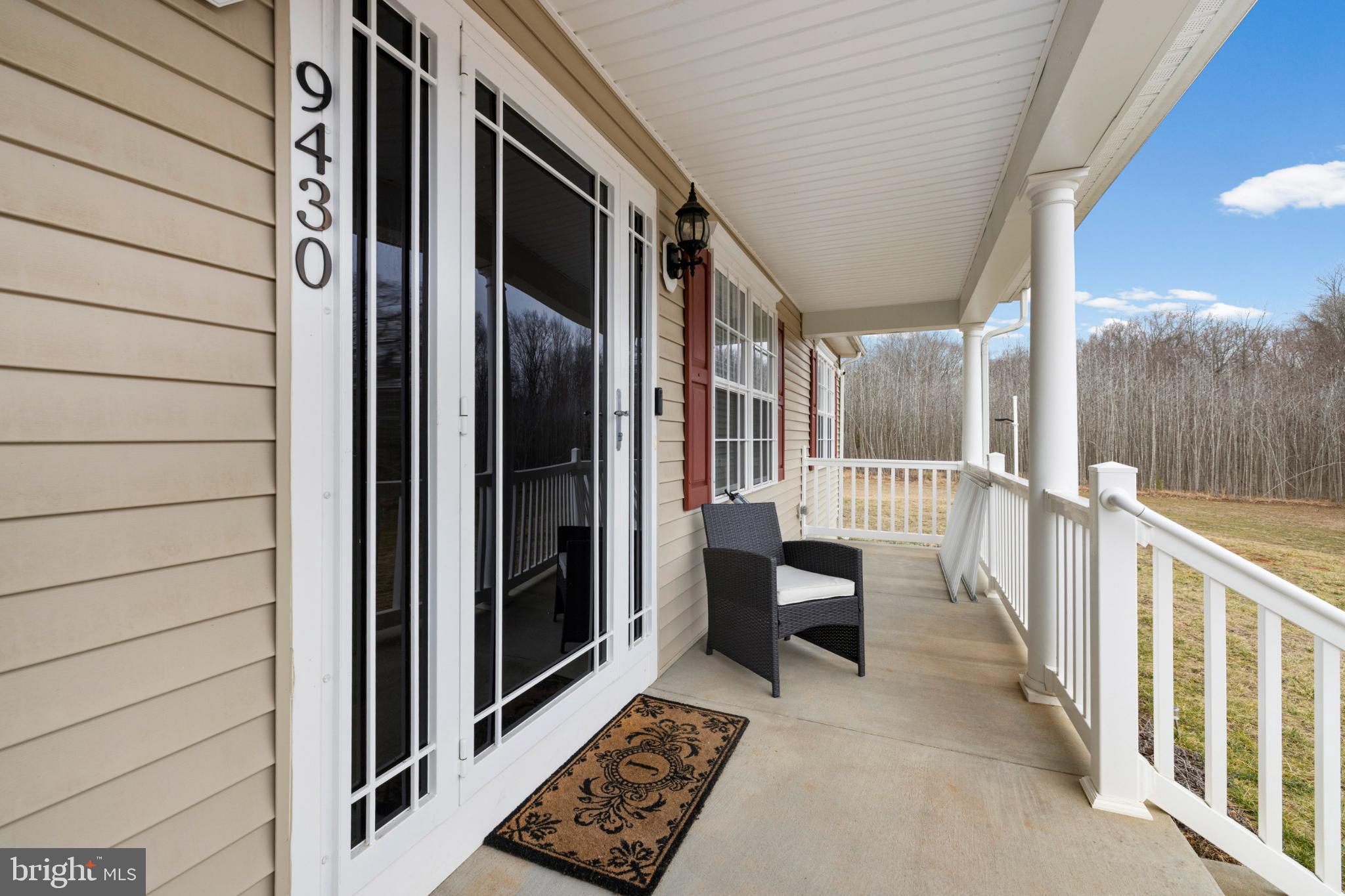 9430 Ironsides Road Nanjemoy, MD 20662 - Photo 3 of 22 Charming porch with serene woodland views.