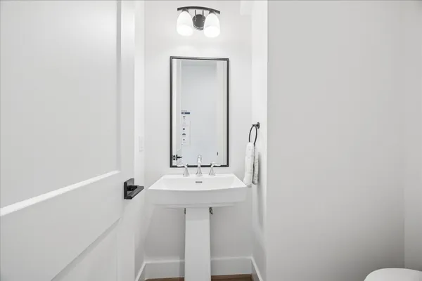 a view of backyard of house with green space