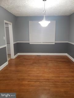 5358 Cuthbert Avenue Baltimore, MD 21215 - Photo 12 of 20 a view of empty room with window and ceiling fan