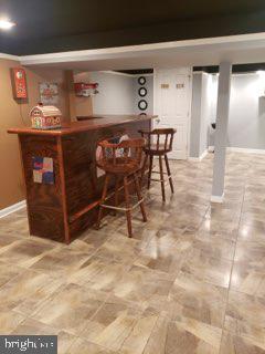5358 Cuthbert Avenue Baltimore, MD 21215 - Photo 4 of 20 a view of a chairs and table in a room