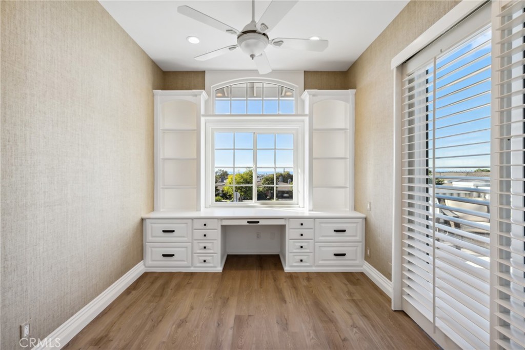 3521 Geranium Avenue, Unit 22 Corona del Mar, CA 92625 - Photo 21 of 37 a living room with a bed furniture and a window