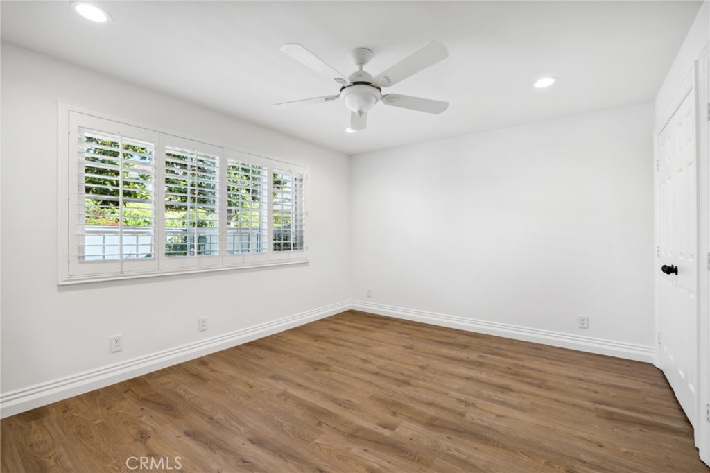 3521 Geranium Avenue, Unit 22 Corona del Mar, CA 92625 - Photo 28 of 37 wooden floor in an empty room with a window