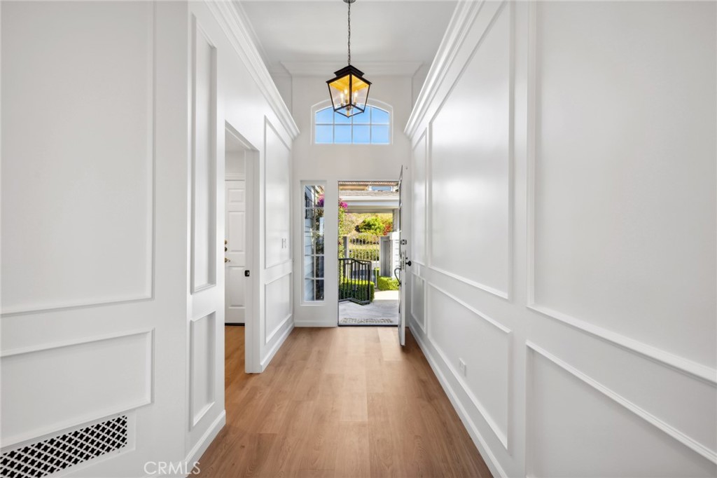 3521 Geranium Avenue, Unit 22 Corona del Mar, CA 92625 - Photo 6 of 37 a view of hallway with wooden floor