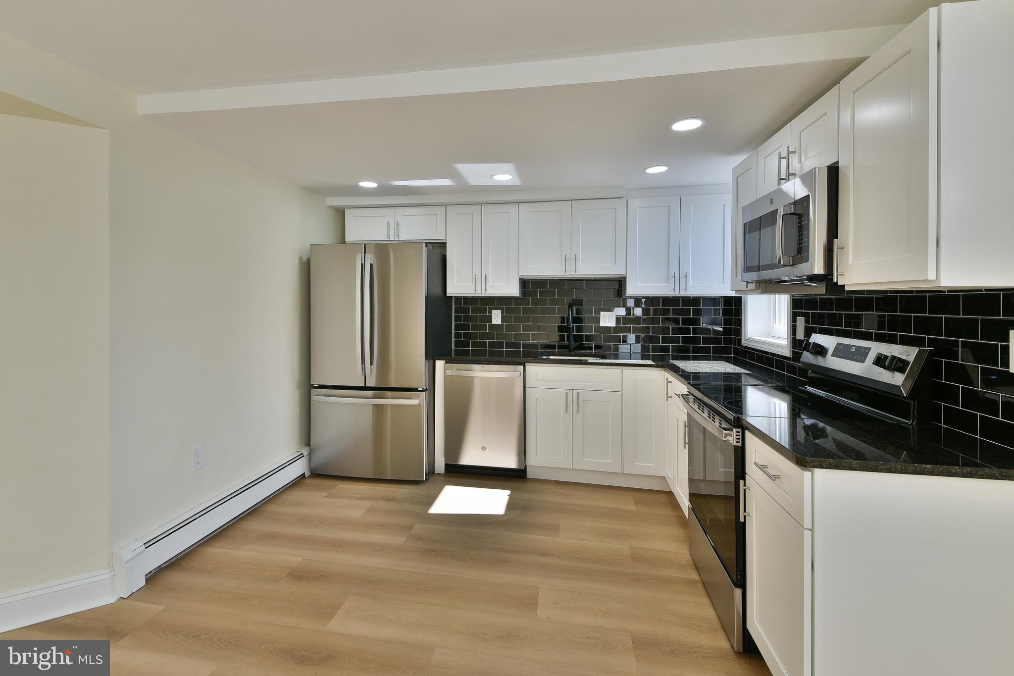 141 Zane Avenue, Unit A Jenkintown, PA 19046 - Photo 11 of 17 Brand new kitchen with stainless appliances