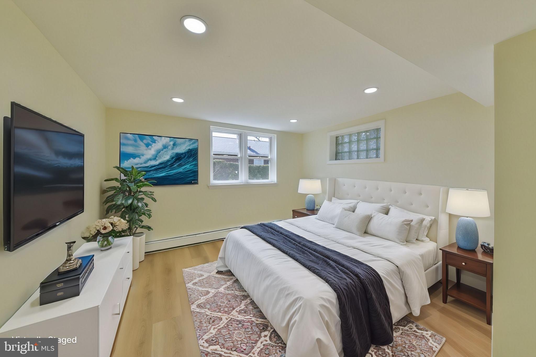 141 Zane Avenue, Unit A Jenkintown, PA 19046 - Photo 13 of 17 Spacious bedroom with ceiling fan V Staged