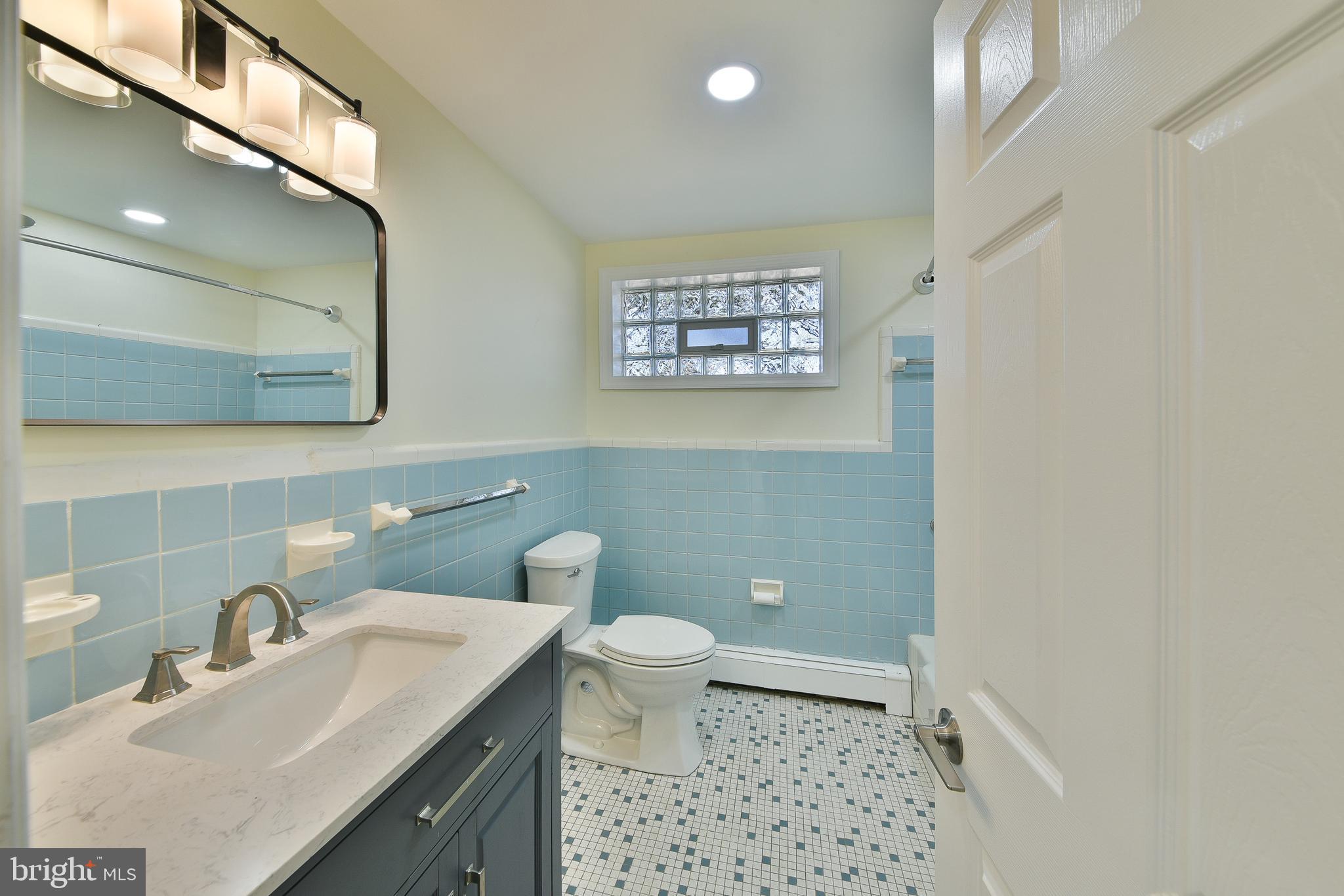 141 Zane Avenue, Unit A Jenkintown, PA 19046 - Photo 15 of 17 Updated bathroom with tile surround