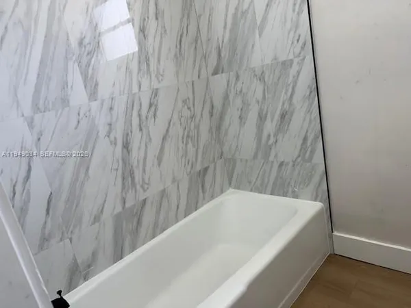 a bathroom with a bathtub