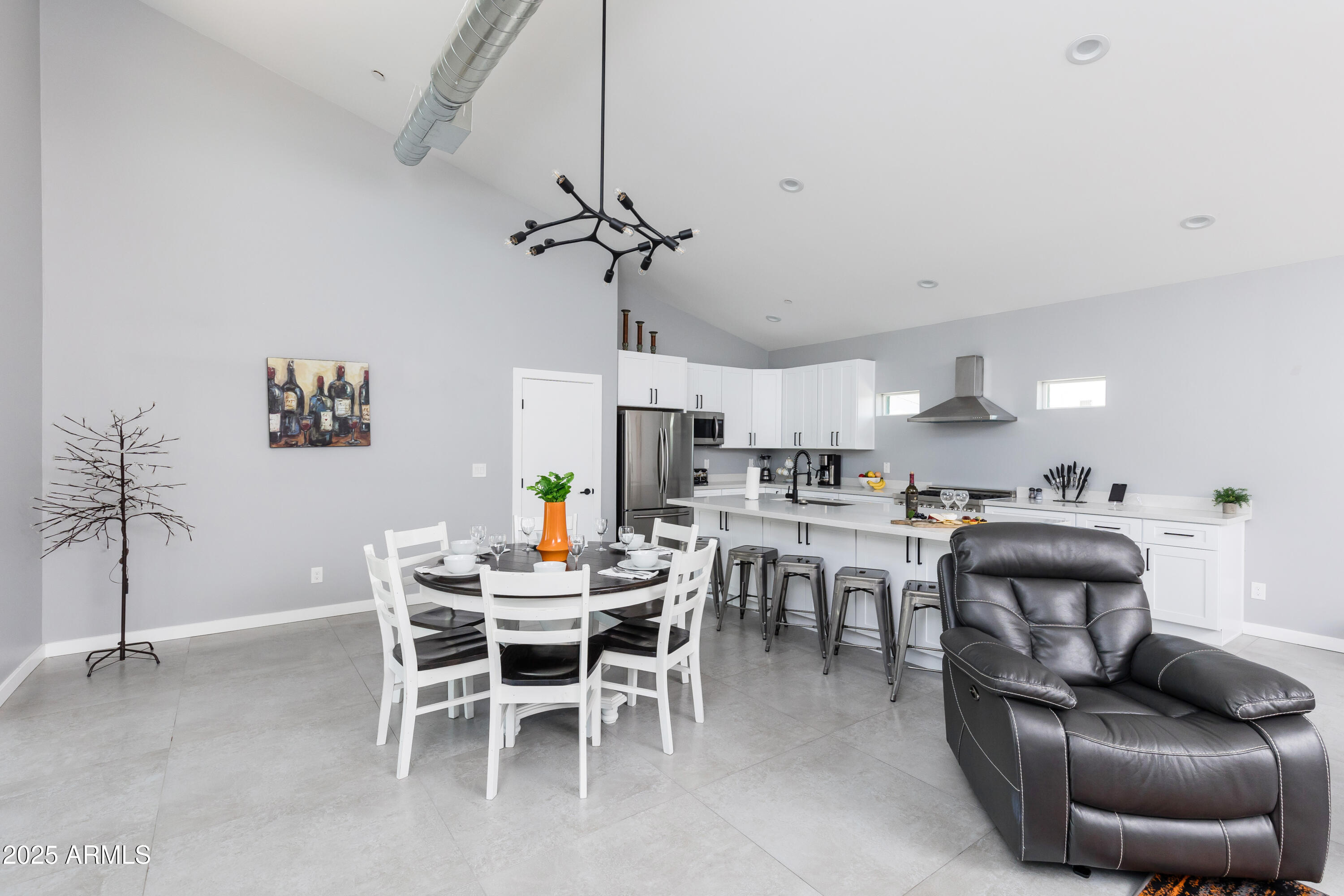 3043 North 85th Place Scottsdale, AZ 85251 - Photo 11 of 33 a dining room with furniture and window