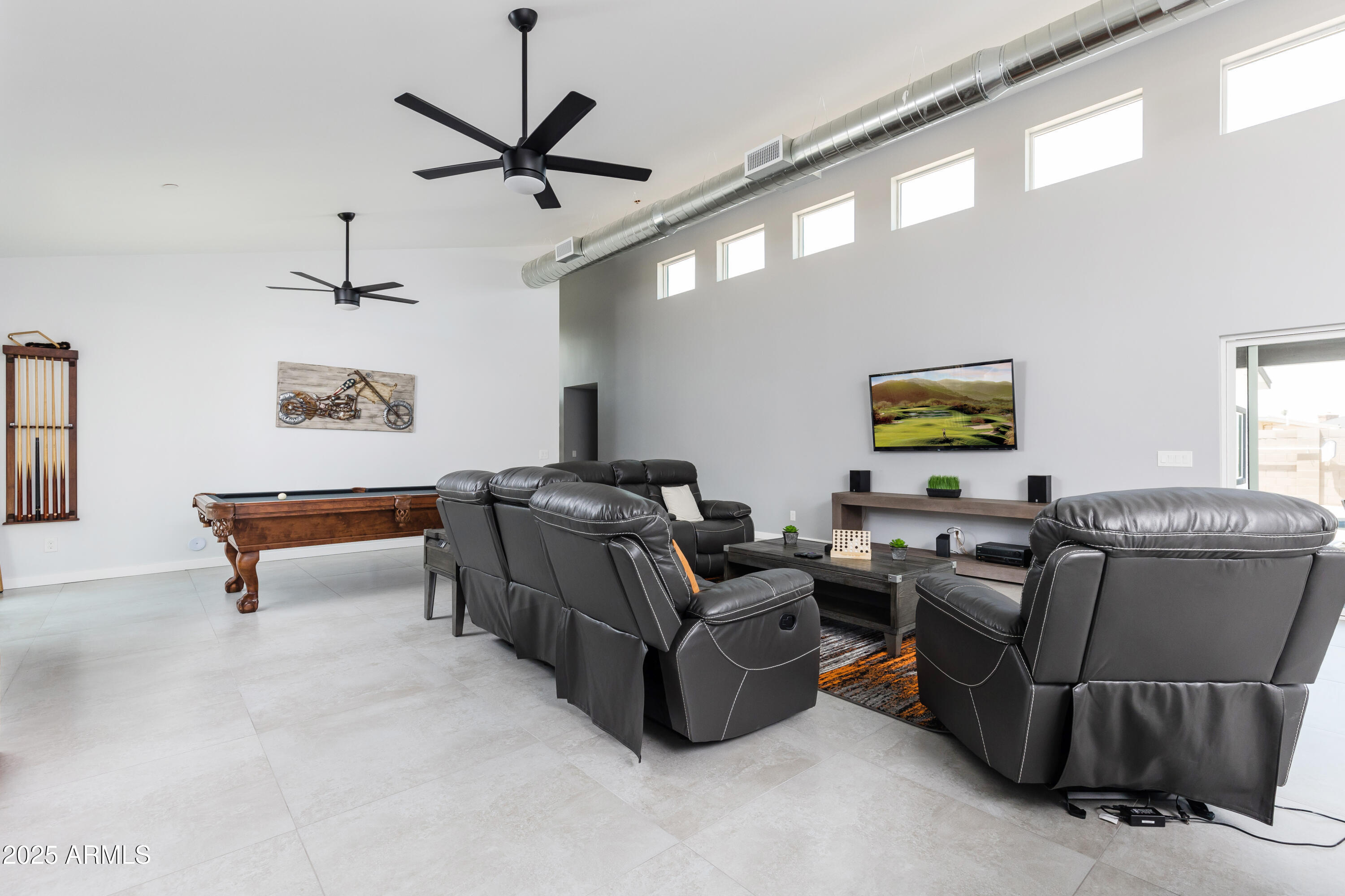 3043 North 85th Place Scottsdale, AZ 85251 - Photo 10 of 33 a living room with furniture and a window