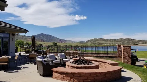 a view of a patio with couches table and chairs