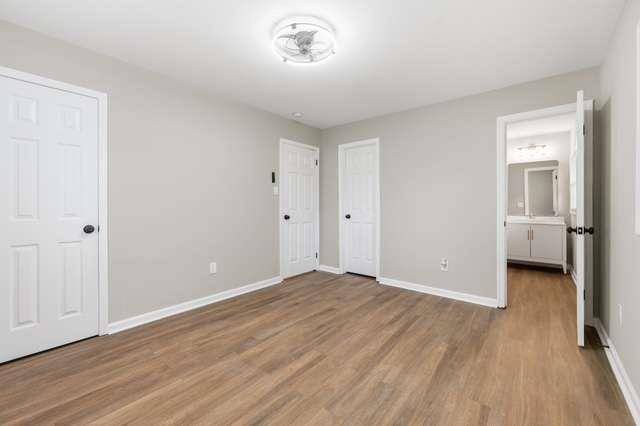 2332 Barge Road Southwest Atlanta, GA 30331 - Photo 11 of 30 a view of a room with wooden floor and a bathroom