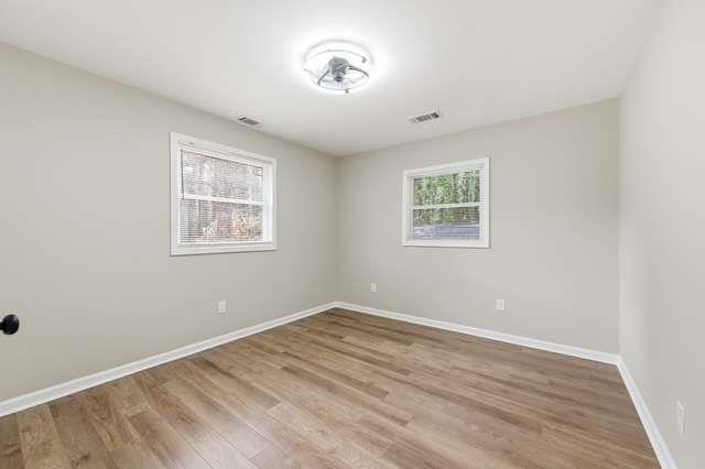 2332 Barge Road Southwest Atlanta, GA 30331 - Photo 15 of 30 a view of room with hardwood floor and window