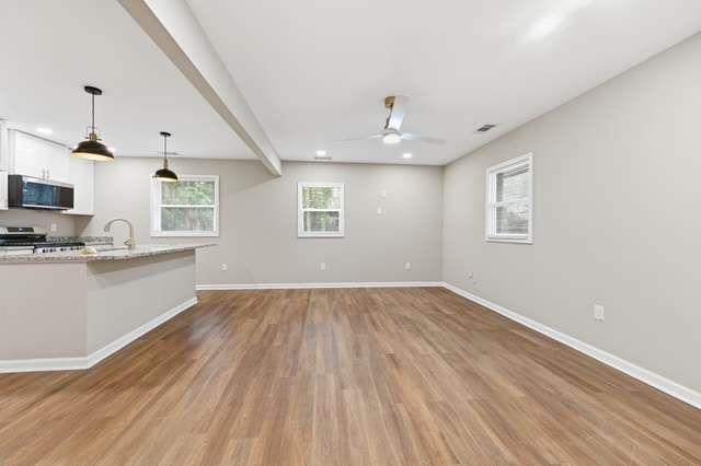 2332 Barge Road Southwest Atlanta, GA 30331 - Photo 20 of 30 a view of an empty room with window and wooden floor