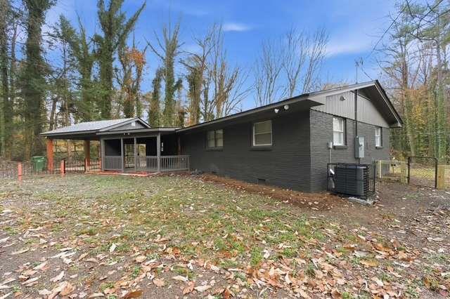 2332 Barge Road Southwest Atlanta, GA 30331 - Photo 27 of 30 a view of house with backyard