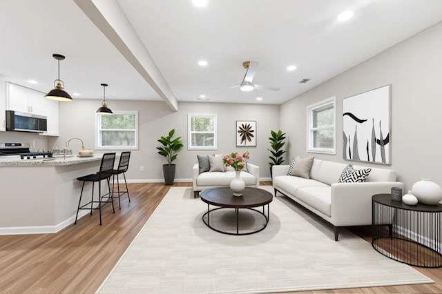 2332 Barge Road Southwest Atlanta, GA 30331 - Photo 3 of 30 a living room with furniture and a wooden floor