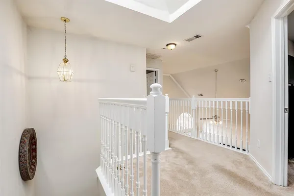 a view of a livingroom with stairs