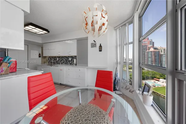 a living room with furniture and flat screen tv