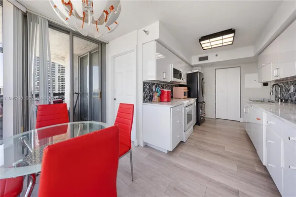 a bedroom with a bed and a table in it