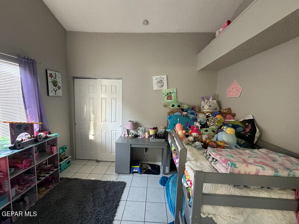 824 Destello Road El Paso, TX 79907 - Photo 13 of 16 a room with a storage space