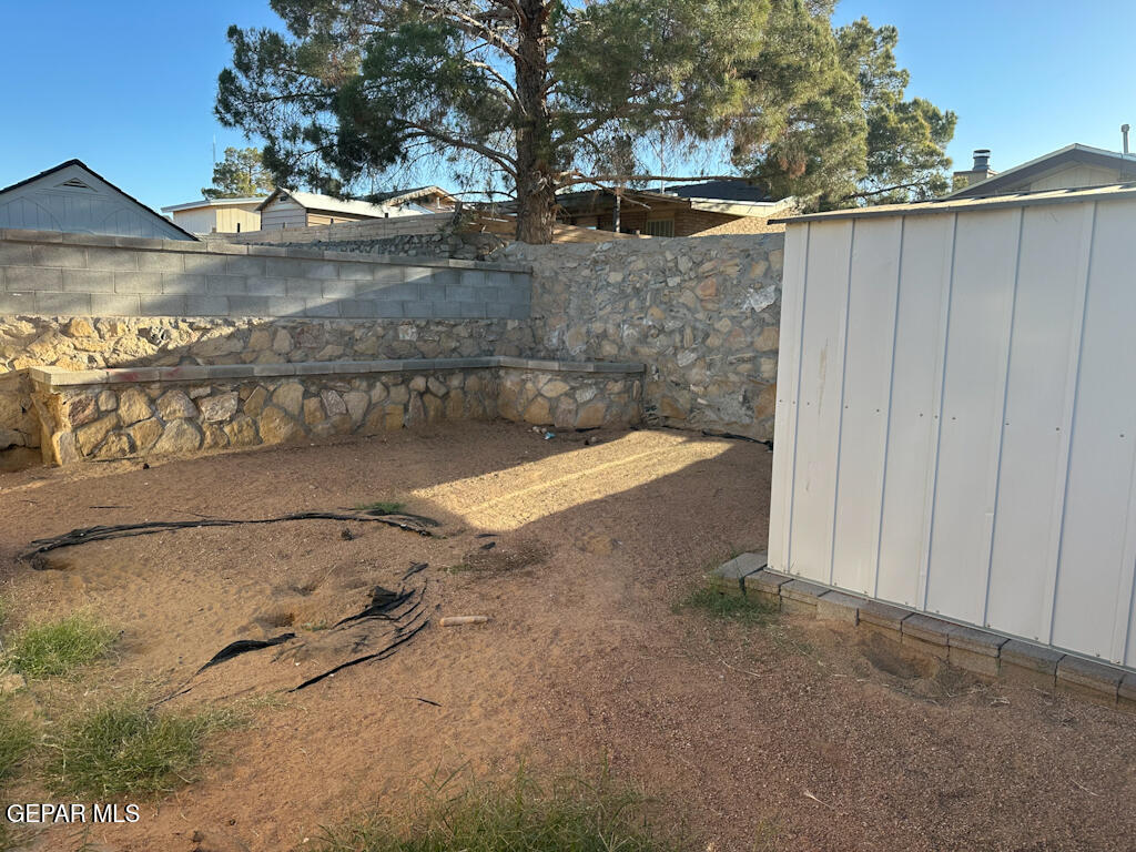 824 Destello Road El Paso, TX 79907 - Photo 16 of 16 a view of backyard with wooden fence