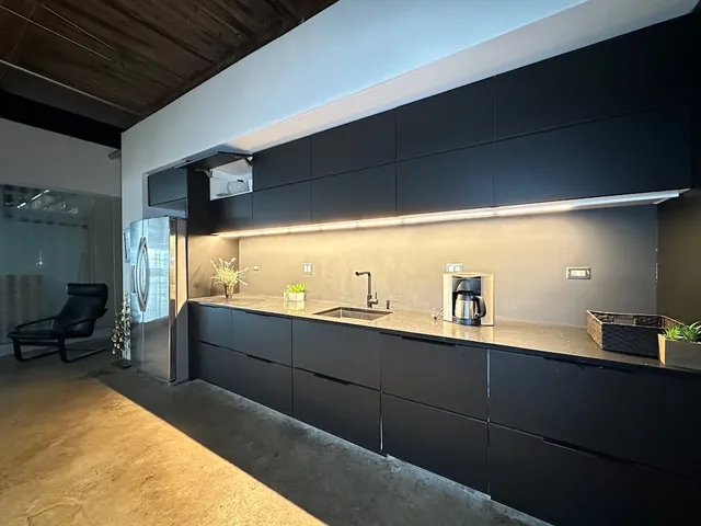 a view of a living room and bathroom